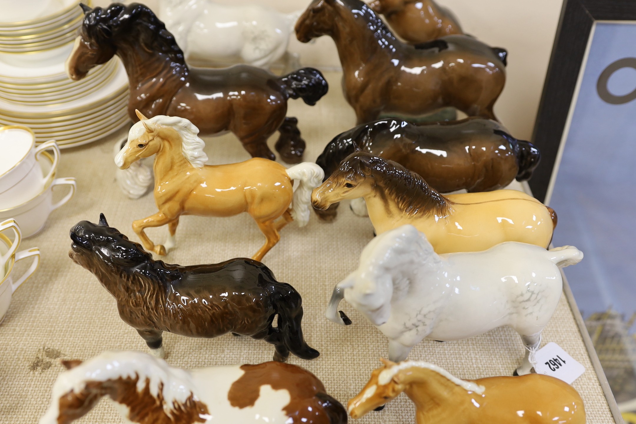 A selection of Beswick horses, to include Highland, Shire, Palomino and others (14)